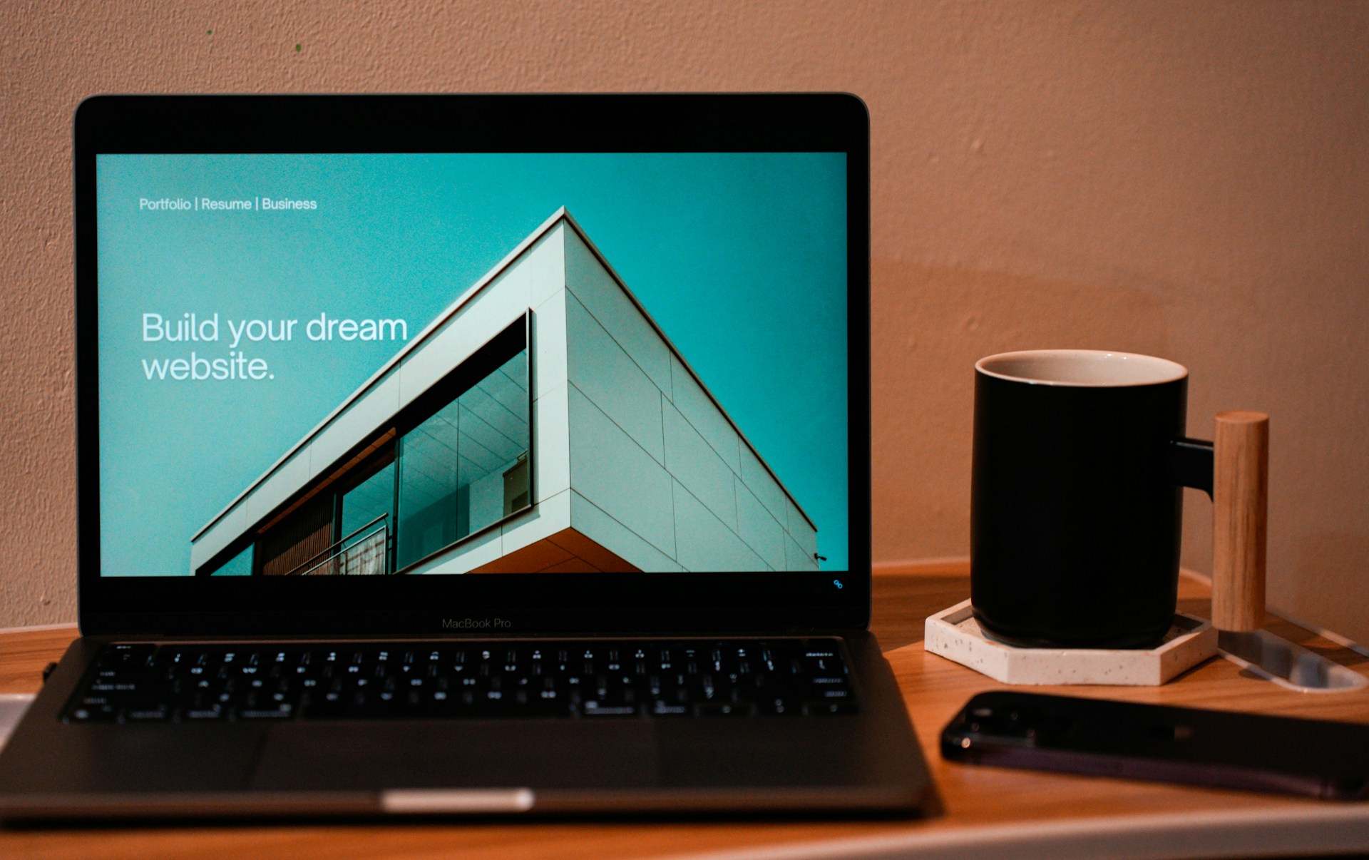 A laptop on a wooden desk